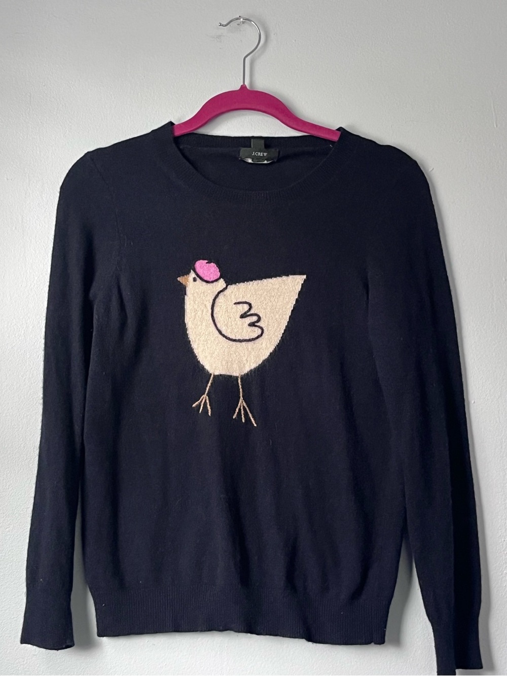 J.Crew French Hen Sweater in black featuring a cashmere-blend knit construction.